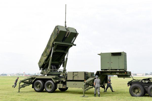 Soldiers from the Japan Air Self-Defense Force set up PAC-3 surface-to-air missile launch systems during a temporary deployment drill at U.S. Yokota Air Base in Tokyo on August 29, 2017. (Toru Yamanaka/AFP/Getty Images)