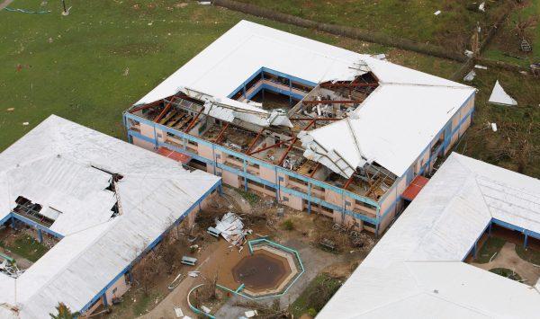 A severely damaged school is seen from a Marine Corps MV-22 Osprey surveying the aftermath from Hurricane Maria in St. Croix, U.S. Virgin Islands on Sept. 21, 2017. (REUTERS/Jonathan Drake)