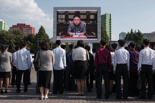 North Koreans listen to a television broadcast of a statement by communist dictator Kim Jong-Un, in Pyongyang, North Korea, on Sept. 22, 2017. (ED JONES/AFP/Getty Images)