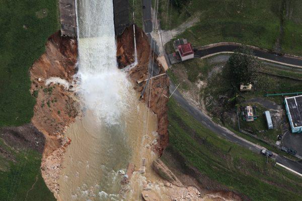 An aerial view shows the damage to the Guajataca dam in the aftermath of Hurricane Maria, in Quebradillas, Puerto Rico on Sept. 23, 2017. (Reuters/Alvin Baez)
