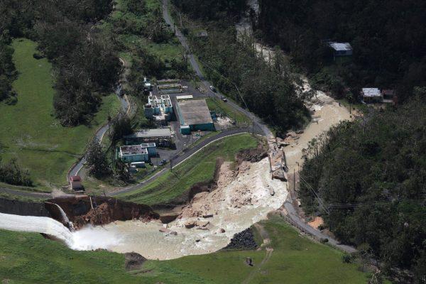 An aerial view shows the damage to the Guajataca dam in the aftermath of Hurricane Maria, in Quebradillas, Puerto Rico September 23, 2017. (Reuters/Alvin Baez)