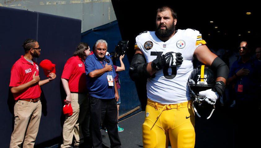 Alejandro Villanueva No. 78 of the Pittsburgh Steelers stands by himself in the tunnel for the national anthem prior to the game against the Chicago Bears on Sept. 24, 2017, in Chicago, Ill. (Joe Robbins/Getty Images)