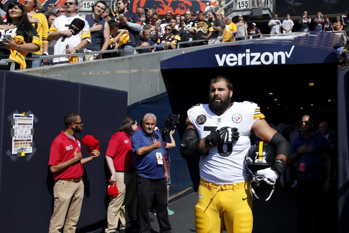 Alejandro Villanueva of the Pittsburgh Steelers stands by himself outside the tunnel for the national anthem prior to the game against the Chicago Bears at Soldier Field in Chicago on Sept. 24, 2017. (Joe Robbins/Getty Images)