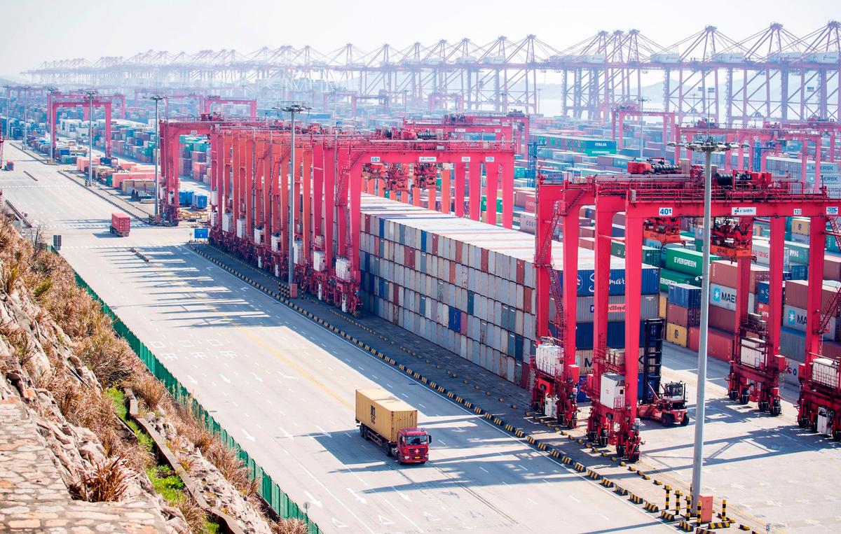 Containers with Chinese goods are organized for trade at the Yangshan Deep Water Port in Shanghai on Feb. 13, 2017. (Johannes Eisele/AFP/Getty Images)