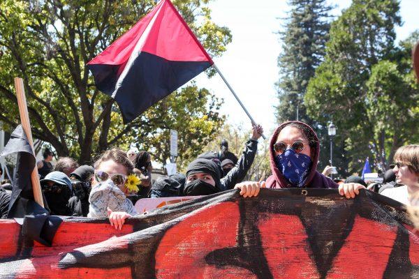 Antifa members and counter-protesters gather during a rightwing No-To-Marxism rally on Aug. 27, 2017, at Martin Luther King Jr. Park in Berkeley, California. (Amy Osborne/AFP/Getty Images)