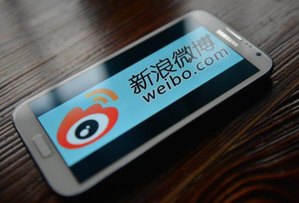A smartphone displaying the logo of Chinese microblogging platform, Weibo, taken on March 19, 2014. (Peter Parks/AFP/Getty Images)