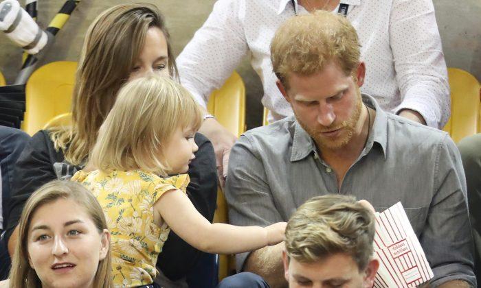Prince Harry Gets Popcorn Stolen by Toddler
