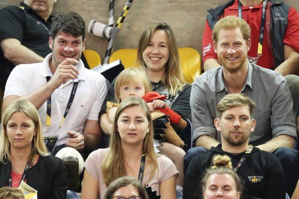 Athlete David Henson (L), wife Hayley Henson, daughter Emily Henson sit with Prince Harry at the Sitting Volleyball Finals during the Invictus Games 2017 at Mattamy Athletic Centre on Sept. 27, 2017, in Toronto. (Chris Jackson/Getty Images for the Invictus Games Foundation)