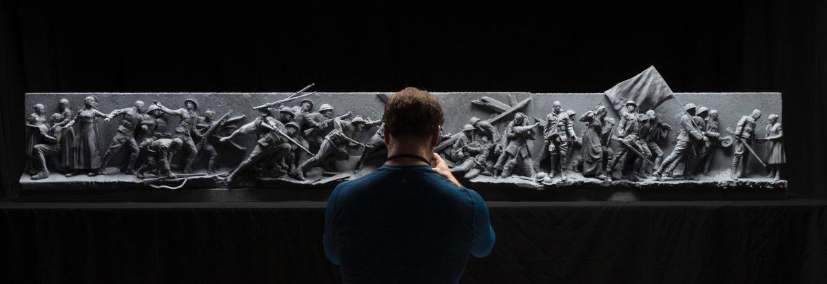 Sabin Howard takes a photo of a test sculpture for "A Soldier's Journey." World War I memorial at the Weta Workshop Imaging Department in Wellington, New Zealand, in August. (Courtesy of Sabin Howard)