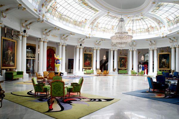 Salon Royal at Hotel Negresco in Nice displays an impressive collection of French royal portraits. In the centre of the stained glass ceiling is a spectacular Baccarat 16,309-crystal chandelier. (Courtesy of Negresco Hotel)