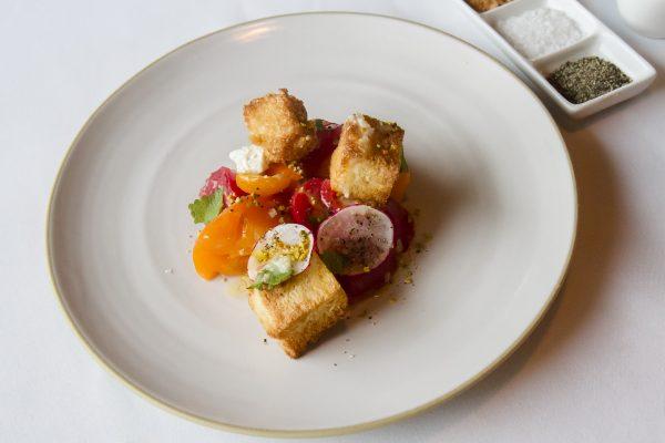 Chino Farm’s tomatoes are a taste of pure summer in this dish from California Modern at George's At the Cove. (Channaly Philipp/The Epoch Times)