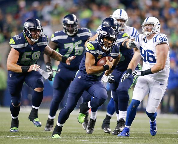 Quarterback Russell Wilson No. 3 of the Seattle Seahawks breaks free to rush for 23 yards for a touchdown against the Indianapolis Colts in the third quarter of the game at CenturyLink Field on Oct. 1, 2017, in Seattle, Wash. (Jonathan Ferrey/Getty Images)