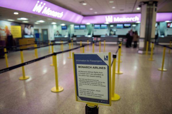 A notice at the company's check-in at Birmingham Airport informs passengers that Monarch Airlines has ceased trading, in Birmingham, central England on Oct. 2, 2017.<br/>(Oli Scarff/AFP/Getty Images)