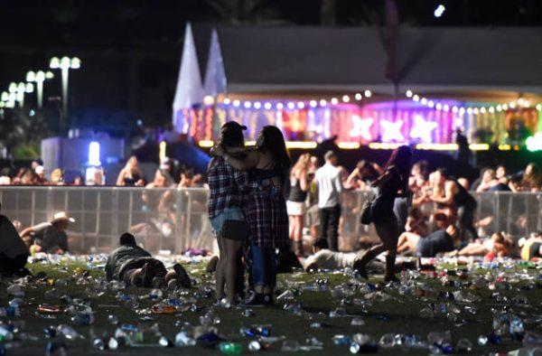 People run from the Route 91 Harvest country music festival after gunfire was heard in Las Vegas on Oct. 1, 2017. (David Becker/Getty Images)
