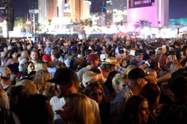 A crowd of people at the Route 91 Harvest country music festival after apparent gun fire was heard in Las Vegas, Nevada on Oct. 1, 2017. (Photo by David Becker/Getty Images)
