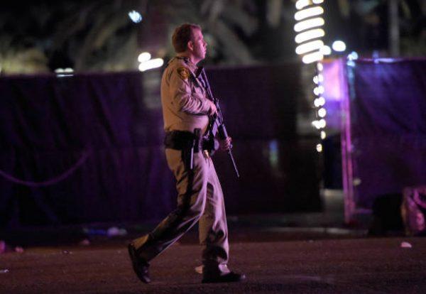 Las Vegas police patrol along the streets outside the Route 91 Harvest country music festival grounds after an active shooter was reported in Las Vegas on Oct. 1, 2017. (David Becker/Getty Images)