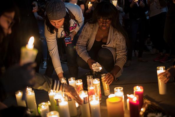 Mourners light candles during a vigil for the victims of the mass shooting on Oct. 2, 2017. (Drew Angerer/Getty Images)