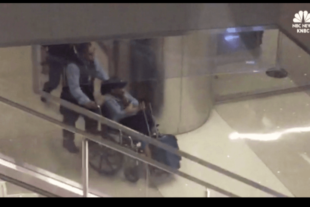 Girlfriend of Las Vegas Shooter Taken Out of Airport in Wheelchair