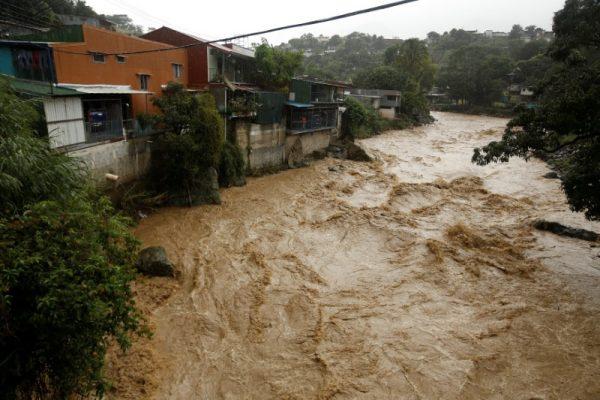 The flooded Tiribi river is seen during heavy rains of Tropical Storm Nate that affects the country in San Jose, Costa Rica October 5, 2017. (REUTERS/Juan Carlos Ulate)