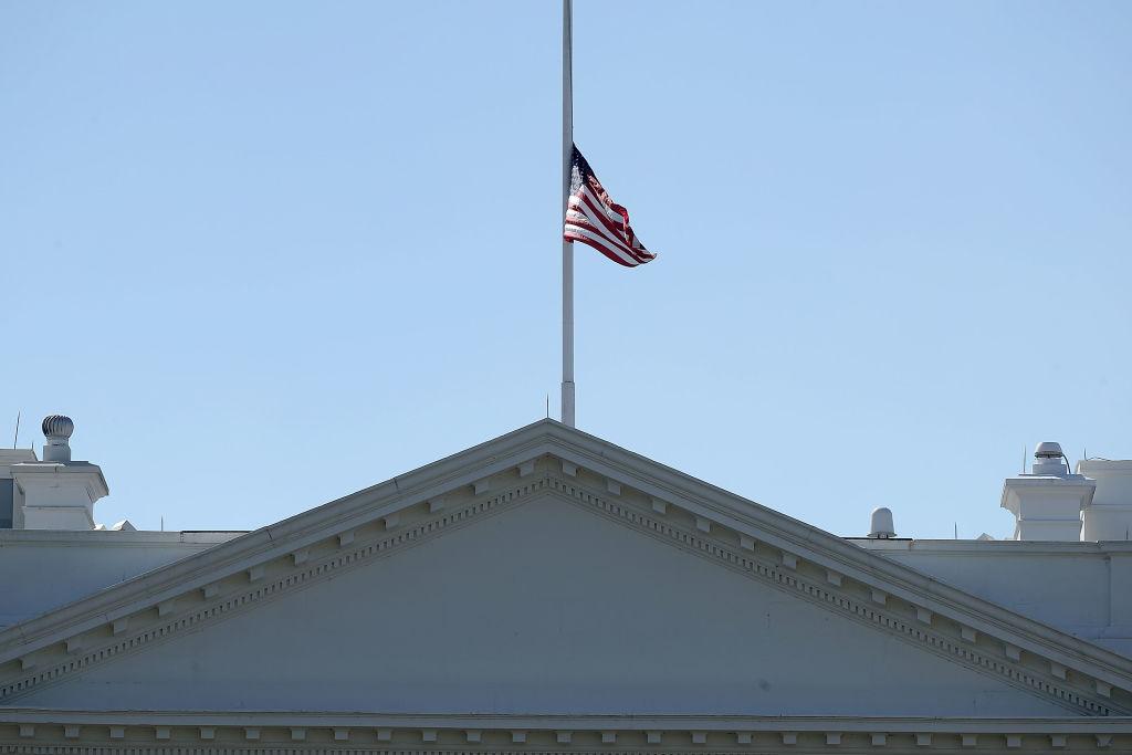 The U.S. flag flies at half-staff over the White House in Washington on Oct. 2, 2017. President Donald Trump ordered the flags on all federal buildings to fly at half-staff following the Las Vegas mass shooting. (Chip Somodevilla/Getty Images)