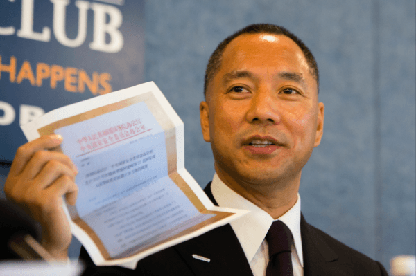Exiled Chinese billionaire Guo Wengui holds photocopies of alleged document that shows Chinese regime send spies to the United States, at a press conference in Washington, on Oct. 5, 2017. U.S. State Department reportedly blocked FBI from arresting a group of Chinese intelligence officers who were trying to approach Guo in New York on May 26, 2017. (Samira Bouaou/The Epoch Times)