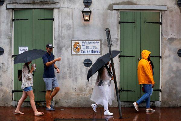 Tourists walk down Bourbon Street as Hurricane Nate approaches the U.S. Gulf Coast in New Orleans, Louisiana, U.S. October 7, 2017. (Reuters/Jonathan Bachman)