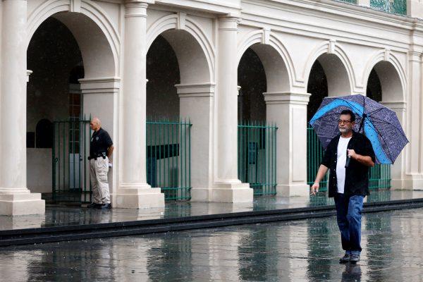 A man walks through the French Quarter as Hurricane Nate approaches the U.S. Gulf Coast in New Orleans, Louisiana, U.S. October 7, 2017. (Reuters/Jonathan Bachman)