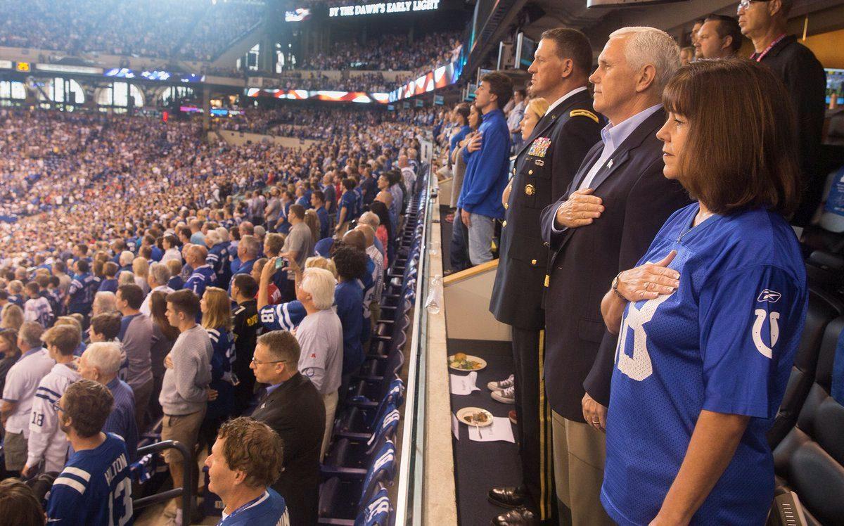 Vice President Mike Pence and Second Lady Karen Pence stand during the national anthem prior to the start of an NFL football game between the Indiana Colts and the San Francisco 49ers at the Lucas Oil Stadium in Indianapolis, Indiana on Oct. 8, 2017. (White House/Myles Cullen/Handout via Reuters)