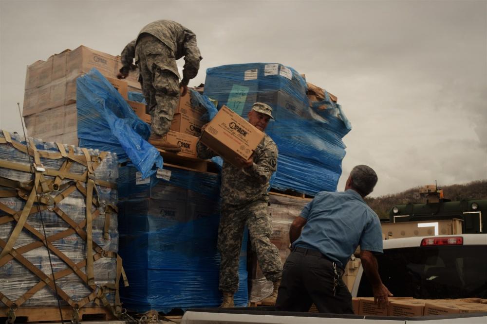 Soldiers assist the Federal Emergency Management Agency to deliver relief supplies to the residents of Puerto Rico. (DoD photo by Raymond Piper)