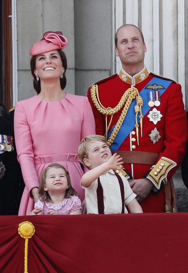 In this June 17, 2017 file photo Britain’s Kate, The Duchess of Cambridge, Prince William and their children Princess Charlotte and Prince George appear on the balcony of Buckingham Palace, after attending the annual Trooping the Colour Ceremony in London. (AP Photo/Kirsty Wigglesworth, File)
