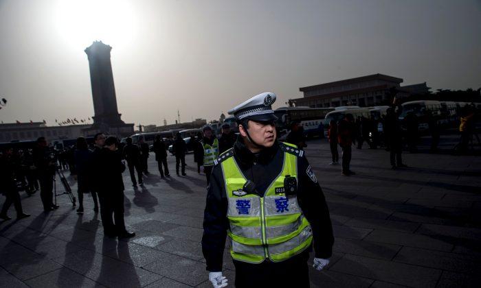 Mother of Detained Canadian Citizen Tries to Sue Beijing Police for Torture, Imprisonment
