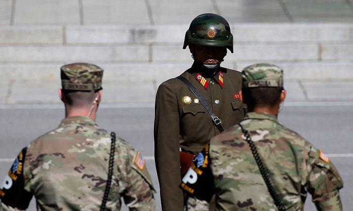 North Korean Soldier, Shot and Wounded, Defects to South