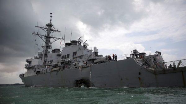 The U.S. Navy guided-missile destroyer USS John S. McCain is seen after a collision, in Singapore waters on Aug. 21, 2017. (Reuters/Ahmad Masood/File Photo)