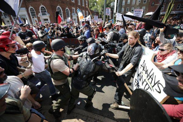 Protesters clash with counter-protesters as they enter Emancipation Park during the "Unite the Right" rally in Charlottesville, Va., on Aug. 12, 2017. (Chip Somodevilla/Getty Images)