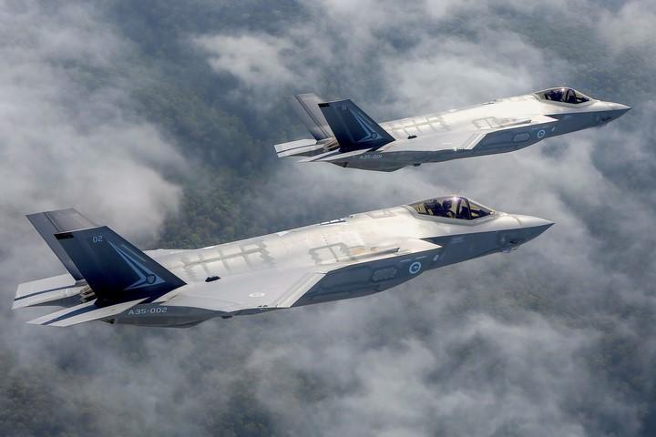 Two Lockheed Martin Corp F-35 stealth fighter jets fly to the Avalon Airshow in Victoria, Australia, on March 3, 2017. (Australian Defence Force/Handout via Reuters)