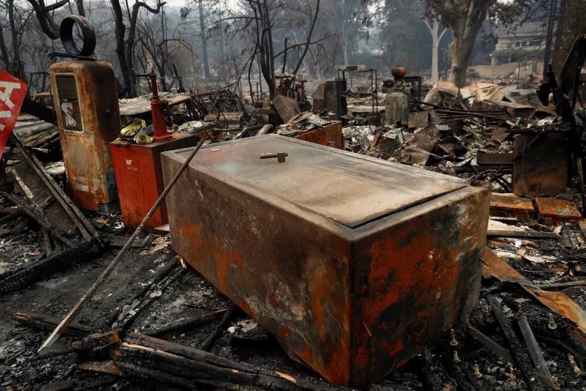 Remains of a charred safe damaged by the Nuns Fire is seen in Glen Ellen, California, Oct. 11, 2017. (REUTERS/Stephen Lam)