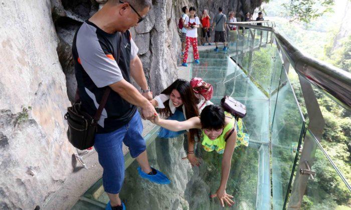 The Glass Bridge in China That’s Made to Crack Under Tourists’ Feet