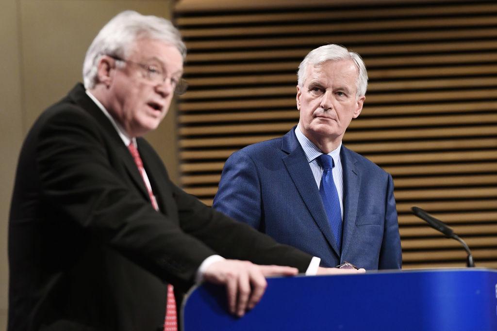 British Secretary of State for Exiting the European Union David Davis (L) and European Union Chief Negotiator in charge of Brexit negotiations with Britain Michel Barnier (R) address media representatives at the European Union Commission in Brussels on Oct. 12, 2017. (Emmanuel Dunand/AFP/Getty Images)