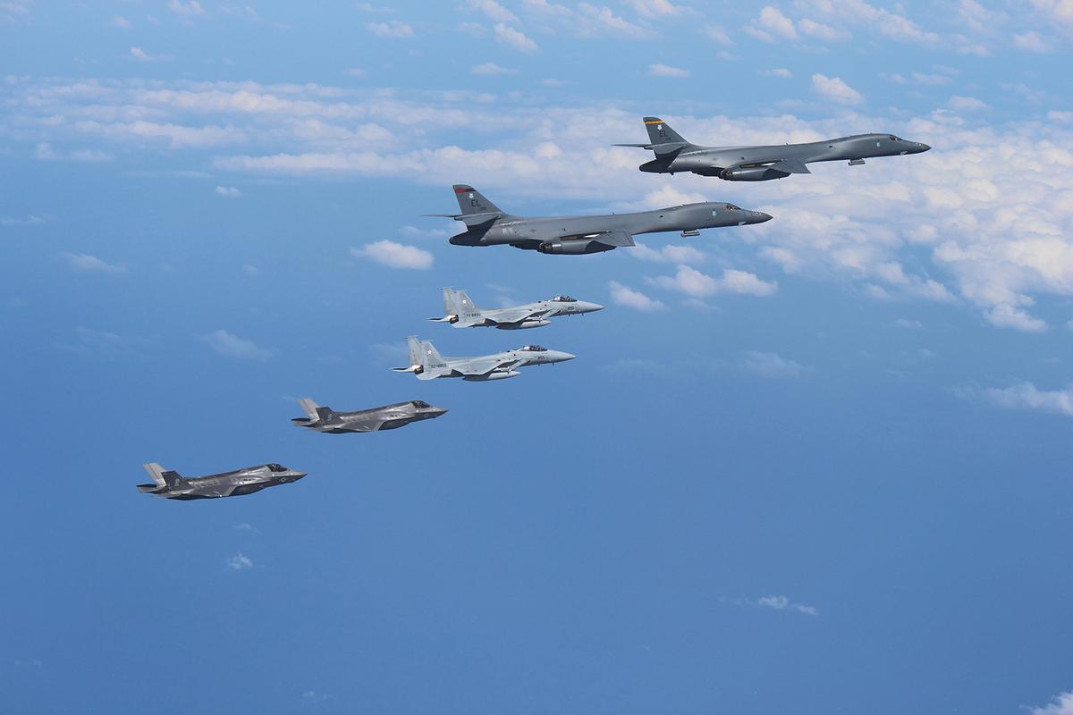 U.S. Marine Corps F-35B Lightning II stealth fighters fly alongside 2 U.S. Air Force B-1B Lancers assigned before joining up with two Koku Jieitai (Japan Air Self-Defense Force) F-15J fighters in Japanese airspace near Kyushu, Japan, Aug. 31, 2017. (Japan Air Self-Defense Force)