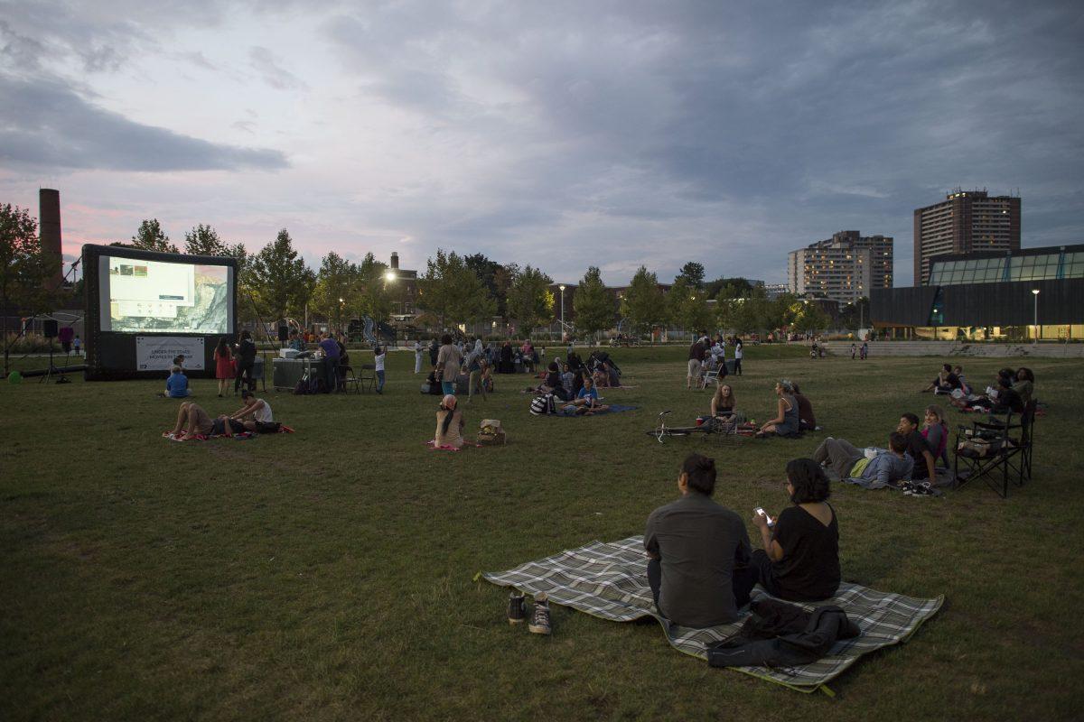 The showing of a film under the stars at Regent Park. (Courtesy of Daniels Corporation)