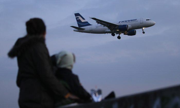 Passengers Board Flight 666 to HEL on Friday the 13th, for Last Time