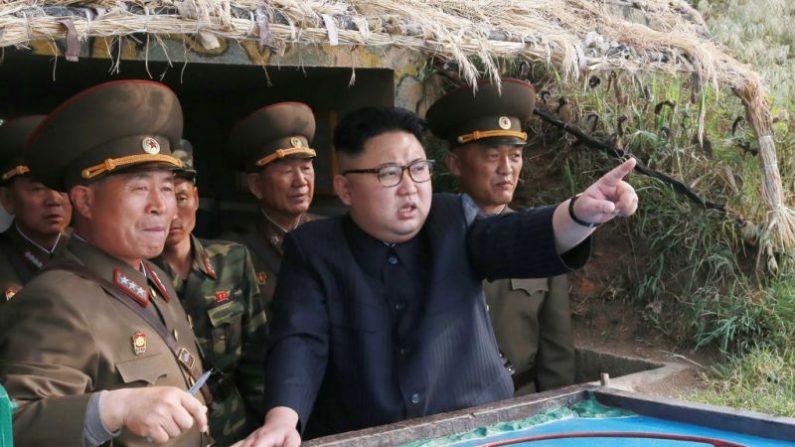 This undated picture released from North Korea's official Korean Central News Agency (KCNA) on May 5, 2017, shows North Korean leader Kim Jong-Un (C) inspecting the defense detachment on Jangjae Islet. (AFP/Getty Images)