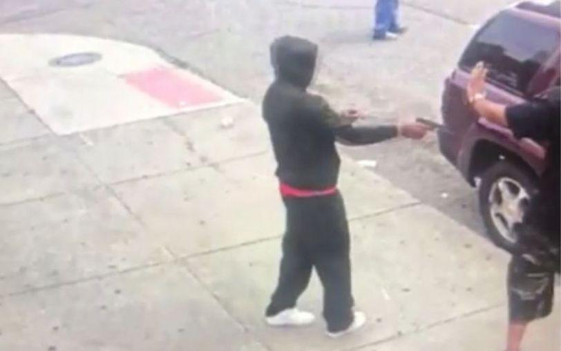 The victim in the shorts was carrying a concealed gun. He produced it and opened fire. (Screenshot/security footage via Fox2)