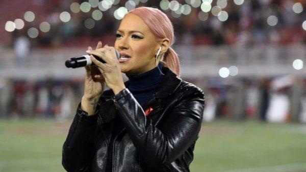 Kaya Jones sings "God Bless America" before a game between the San Diego State Aztecs and the UNLV Rebels at Sam Boyd Stadium in Las Vegas on Oct. 7, 2017. (Ethan Miller/Getty Images)