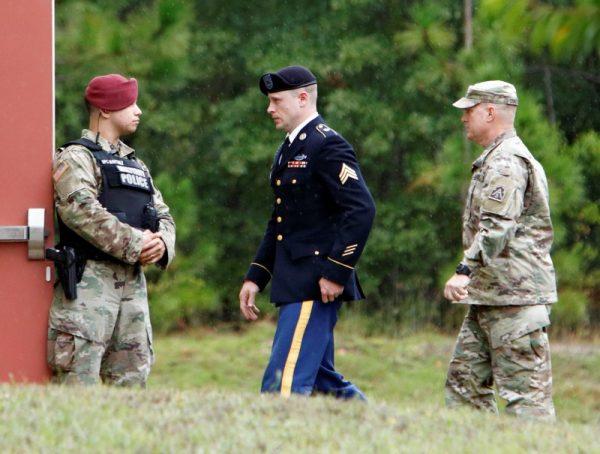 Sgt. Robert B. Bergdahl (C) is escorted into the court house after a lunch break during his hearing in the case of United States vs. Bergdahl in Fort Bragg, North Carolina, U.S., October 16, 2017. (Reuters/Jonathan Drake)
