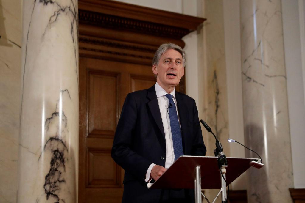 British Finance Minister Philip Hammond speaks at an OECD press conference at the Treasury in London on Oct. 17, 2017. The OECD presented the latest Economic Survey of the UK in the press conference Tuesday. (Photo by Matt Dunham - WPA Pool/Getty Images)