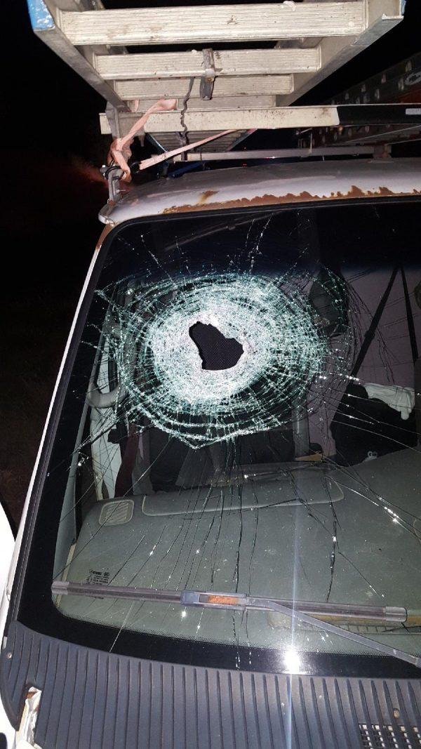 A hole in the windshield of a vehicle driven by late Kenneth White on the I-75 in Vienna Township, Mich., on Oct. 18, 2017. (Genesee County Sheriff’s Office)