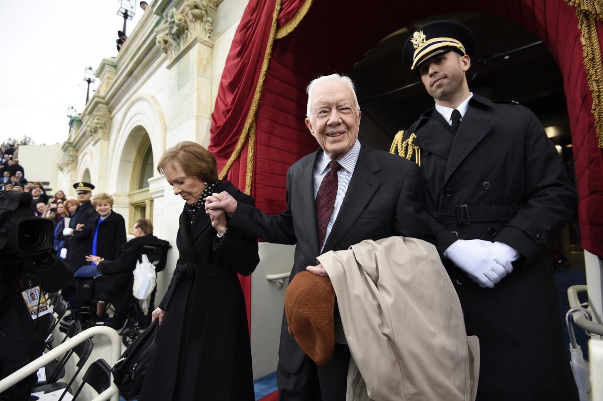 Former US President Jimmy Carter and First Lady Rosalynn Carter arrive for the Presidential Inauguration of Donald Trump at the US Capitol on Jan. 20, 2017. (Saul Loeb - Pool/Getty Images)