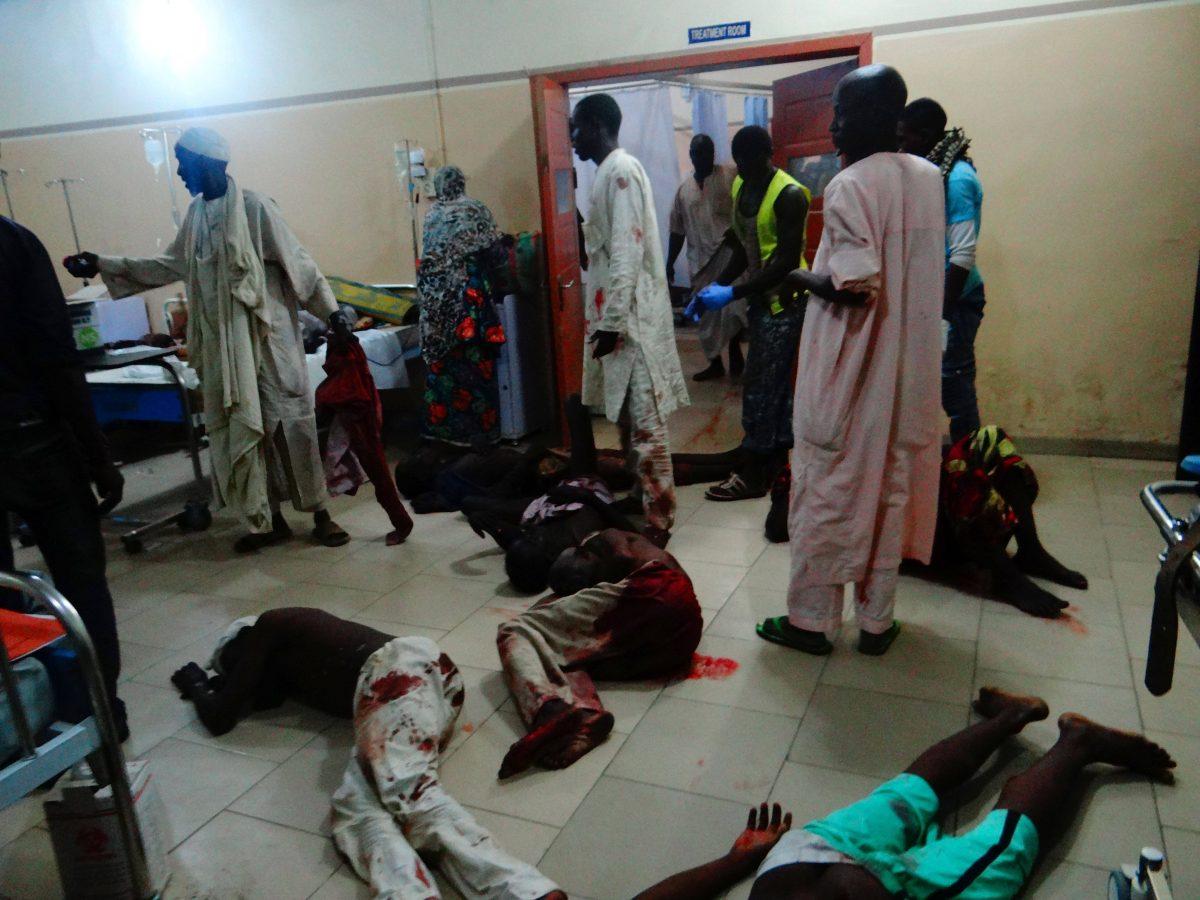 Injured victims of a female suicide bomber lie on the floor awaiting medical attention as beds were no longer available at a Maiduguri hospital in northeastern Nigeria on August 15, 2017. Boko Haram female suicide bomber detonated her explosives killing 28 people and leaving over 80 others injured at a market in the village of Konduga on the outskirts of Maiduguri in northeast Nigeria. (STRINGER/AFP/Getty Images)