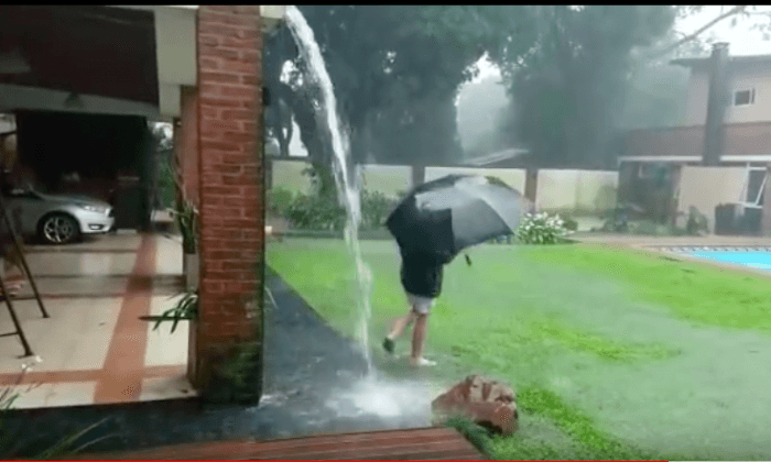 Caught on Camera: Boy Playing in Rain Almost Struck by Lighting